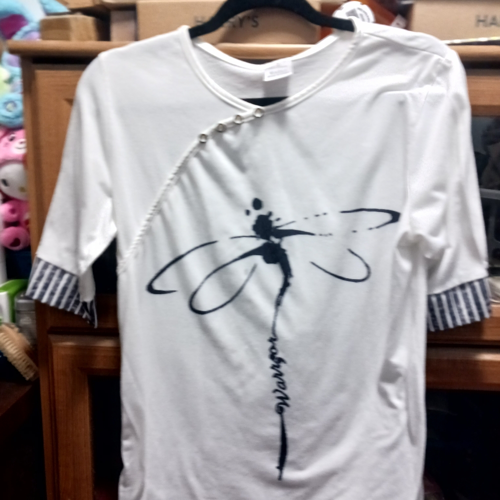 Elegant White Dragonfly Print Women's Tee And Black Striped Pants.